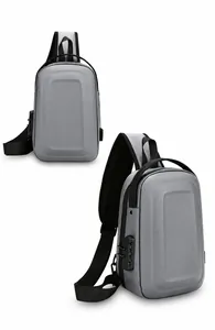 Detail of grey hard shell sling bag featuring anti-theft combination lock and USB port