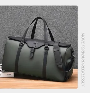 Detail view of large olive travel bag featuring waterproof fabric and padded shoulder strap