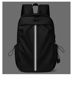 Detail of waterproof zippers and central reflective strip on black travel backpack