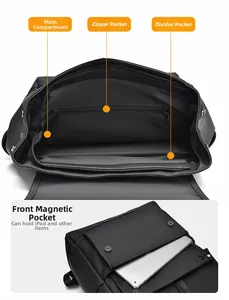 Detail of waterproof black backpack showing main compartment and front magnetic ipad pocket