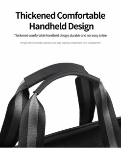 Detail of thickened travel bag handle with high-density striped webbing and shoe compartment