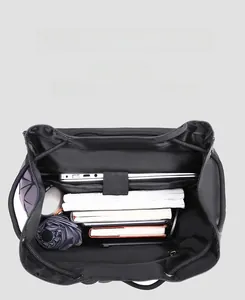 Detail view of large capacity interior with laptop compartment and geometric pattern