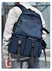 Side view of a navy blue multi-pocket functional backpack with buckle details
