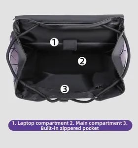 Detail view of laptop compartment and functional interior pockets in geometric backpack