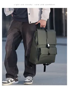 Detailed view of the dark green waterproof matte backpack with flip cover and metal buckle