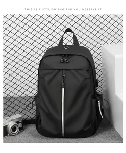 Detail view of black waterproof business backpack with silver vertical zipper and side pocket