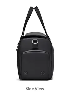 Side view of black waterproof travel bag showing ventilated wet-dry compartment and texture