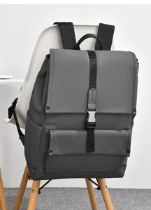 Close-up of modern gray backpack with matte finish and secure black buckle closure