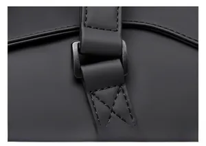 Detail of durable black waterproof fabric with premium metal hardware and precision stitching