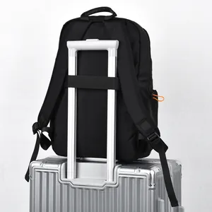 Black waterproof travel backpack with trolley sleeve secured on silver luggage handle
