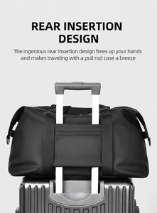 Detail showing back trolley sleeve of black nylon travel bag for suitcase attachment