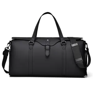 Waterproof black large capacity travel duffel bag for business trip and gym sport use