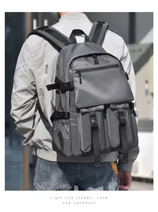 Detail of grey high-capacity backpack with utility pockets and secure buckles