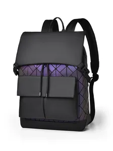 Detail view of reflective geometric triangle pattern and buckle on men's black backpack
