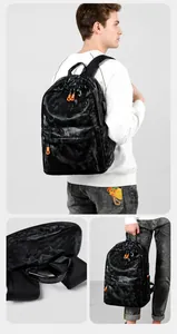 Détails du sac à dos camouflage étanche avec zips orange et port de charge USB