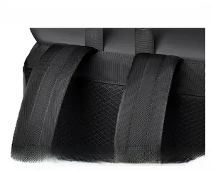 Detail of breathable honeycomb mesh back panel and padded shoulder straps on backpack