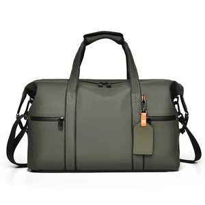 Large olive green waterproof travel duffel bag for gym or business with black straps