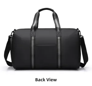 Detail view of the black travel bag back showing the luggage strap and waterproof fabric