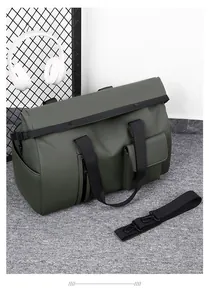 Macro view of olive green waterproof travel bag with large main compartment and shoulder strap