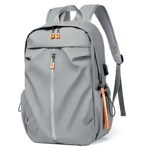 Grey business travel laptop backpack with orange accents and USB port for men