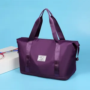 Borsa da viaggio viola impermeabile capiente con scomparto inferiore espandibile