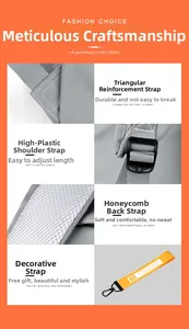 Detail of reinforced triangle stitching, adjustable buckle, and breathable mesh on gray backpack