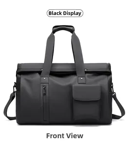 Front view of black waterproof travel bag with reinforced handles and zipper pockets