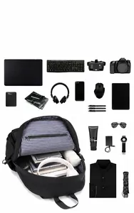 Detail of multi-compartment interior with blue striped lining for waterproof laptop backpack