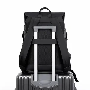Men's black quilted backpack with breathable back panel and luggage strap for travel