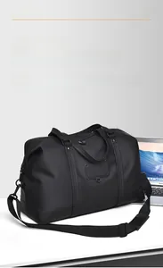 Waterproof travel duffel bag side view with laptop reference showing large capacity