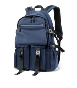 Detail view of deep blue waterproof backpack showing side profile and breathable straps