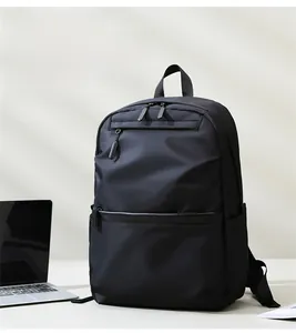 Detailed macro view showing multi-layer storage and large capacity of the black backpack