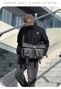 Detail showing waterproof roll-top closure and tactical buckle of the men crossbody bag