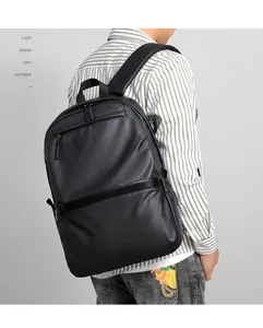 Detail view of the sleek black business backpack with functional multi-zipper compartments