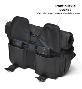 Detail view of tactical messenger bag featuring dual buckle pockets and waterproof fabric