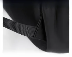 Detail of reinforced triangle stitching on high-density nylon backpack for extra durability