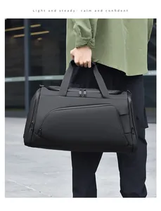 Detail of a black multi-functional sports bag with durable fabric and side zipper pockets