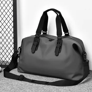 Borsa da viaggio grigia per uomo con manici neri e tracolla regolabile per sport e fitness