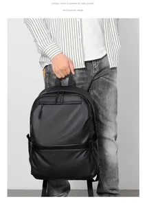 Detail shot of a black waterproof business laptop backpack with smooth matte finish