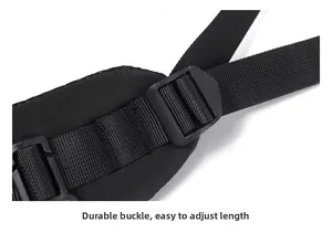 Close-up of thick adjustable buckles and padded nylon straps on a black backpack