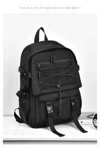 Detail of black backpack with mesh zipper pocket and adjustable compression side straps