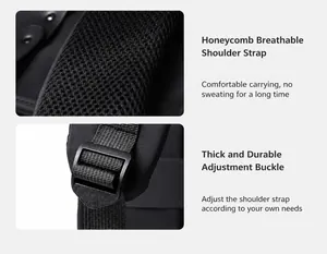 Detail of honeycomb breathable mesh straps and adjustable buckles on a black backpack