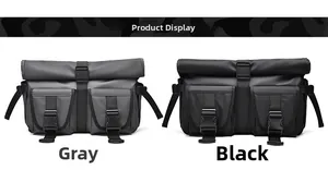 Detail view of grey and black waterproof messenger bags with dual buckle front pockets