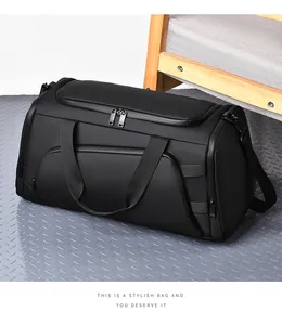 Detail of waterproof black gym bag with heavy duty zippers and adjustable shoulder straps