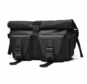 Side view of a black tactical waterproof crossbody bag with dual buckle flap pockets
