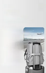 Detail view of lightweight grey backpack with convenient luggage strap for travel convenience