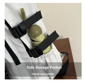 Detail view of the side storage pocket with an umbrella and adjustable buckle strap
