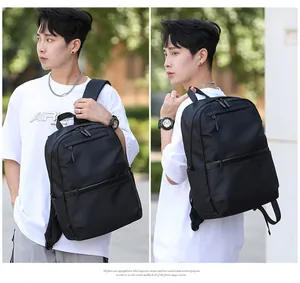 Detail view of large capacity black business backpack with multiple functional compartments