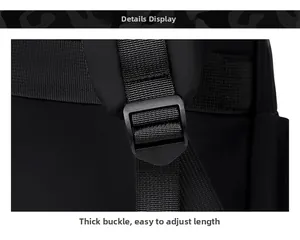 Detail showing a thick adjustable plastic buckle on a durable black nylon backpack strap