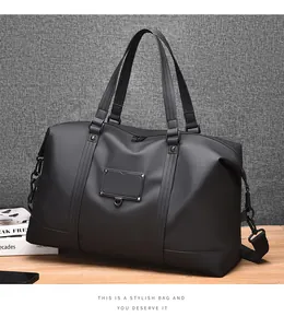 Close-up of durable water-resistant black gym bag fabric with premium metal hardware